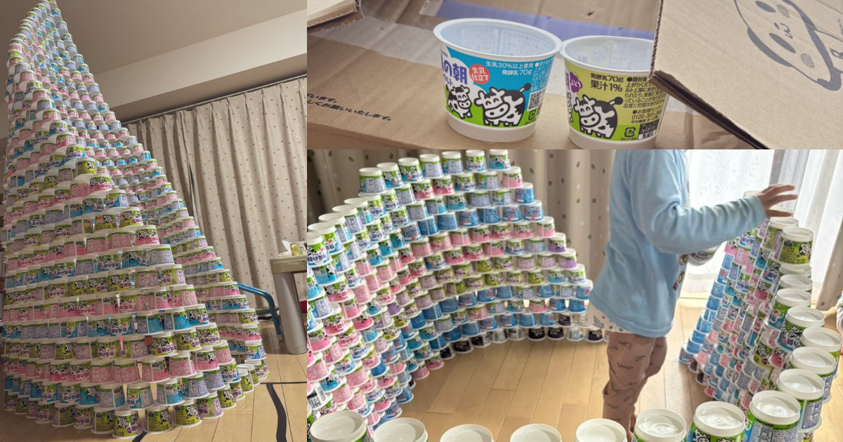 用優格空罐堆疊的巨塔！推主老公與兒子聯手完成的壯觀成品被網友大讚：這根本是藝術吧！